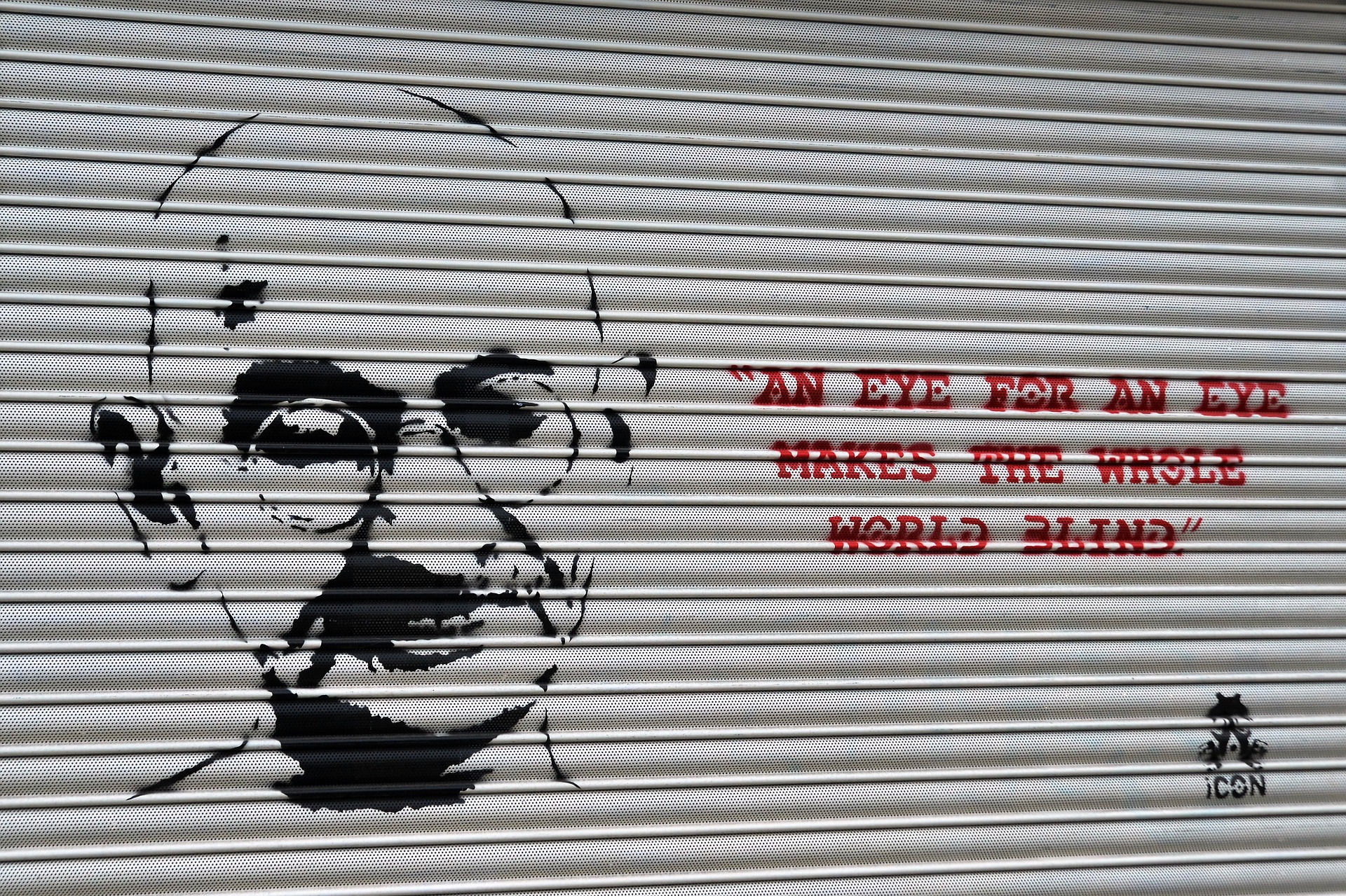 street art - gandhi quote - an eye for an eye makes the whole world blind